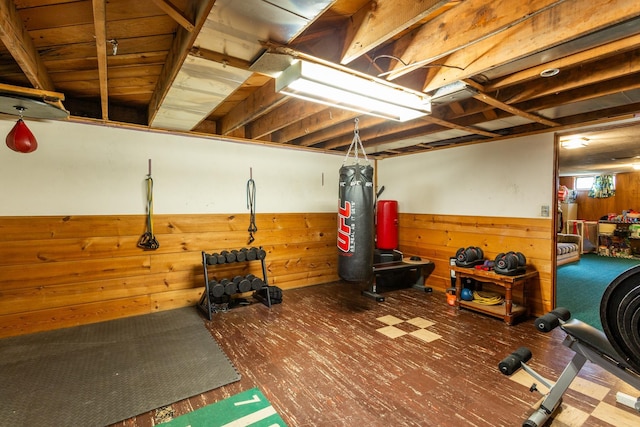 5711 N Ash St, Spokane, WA 99205 - workout room featuring wooden walls, a wainscoted wall, and wood finished floors
