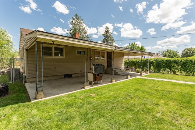 5711 N Ash St, Spokane, WA 99205 - rear view of property featuring entry steps and a chimney
