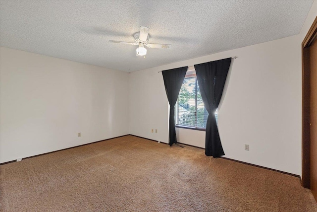3810 S Moffitt Rd, Spokane Valley, WA 99206 - spare room featuring light colored carpet, ceiling fan, and a textured ceiling