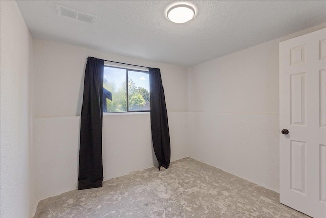 3810 S Moffitt Rd, Spokane Valley, WA 99206 - carpeted spare room with a textured ceiling