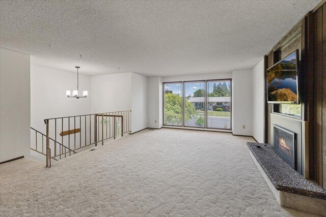 3810 S Moffitt Rd, Spokane Valley, WA 99206 - empty room with a chandelier, a textured ceiling, light colored carpet, and wooden walls