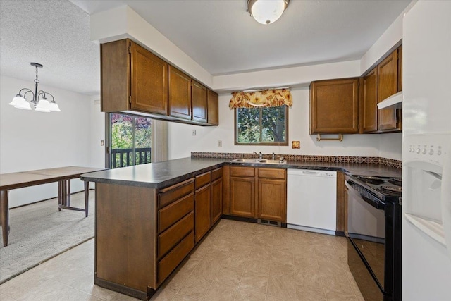 3810 S Moffitt Rd, Spokane Valley, WA 99206 - kitchen with dishwasher, black range with electric stovetop, under cabinet range hood, plenty of natural light, and a textured ceiling
