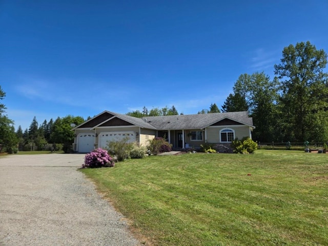 6321 310th St NW Stanwood, Unit Stanwood, WA 98292 - ranch-style home with driveway and a garage