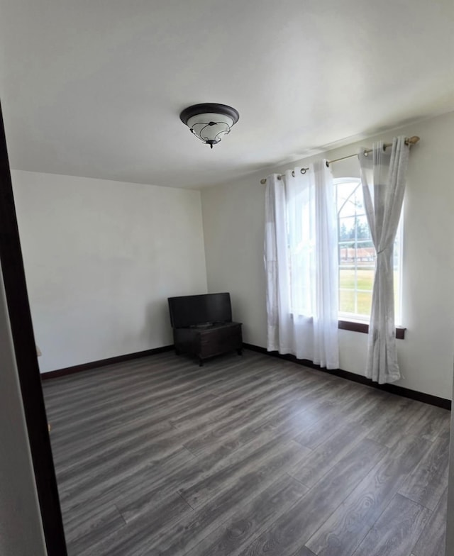 6321 310th St NW Stanwood, Unit Stanwood, WA 98292 - unfurnished room with wood finished floors and baseboards