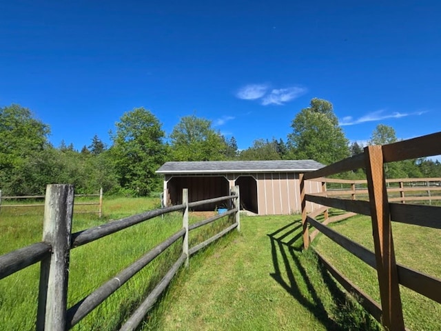 6321 310th St NW Stanwood, Unit Stanwood, WA 98292 - view of yard with an exterior structure and an outdoor structure