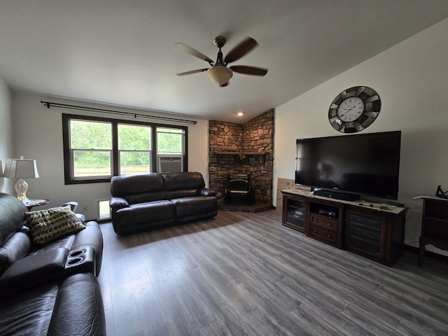 6321 310th St NW Stanwood, Unit Stanwood, WA 98292 - living room featuring ceiling fan, vaulted ceiling, wood finished floors, a fireplace, and cooling unit