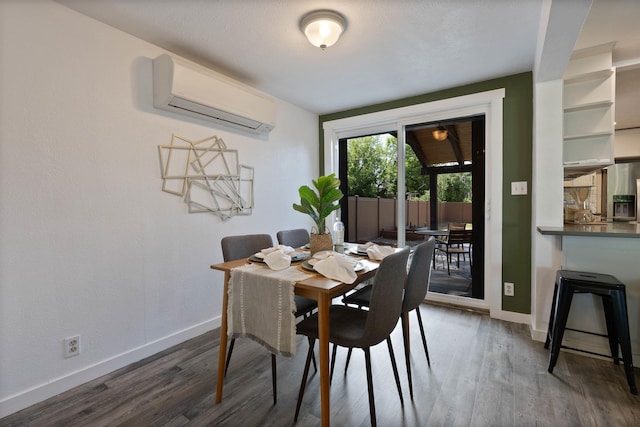 2121 W Cleveland Ave, Spokane, WA 99205 - dining area with a wall mounted air conditioner and wood finished floors