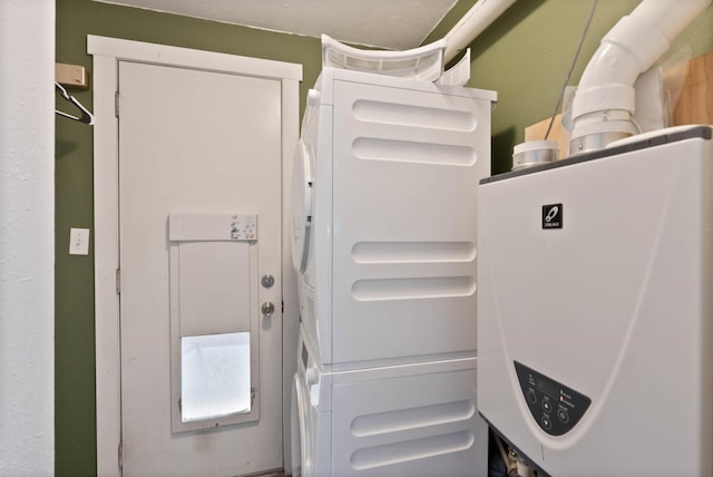 2121 W Cleveland Ave, Spokane, WA 99205 - laundry view of tankless water heater