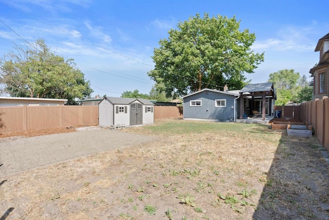 2121 W Cleveland Ave, Spokane, WA 99205 - fenced backyard featuring a storage shed