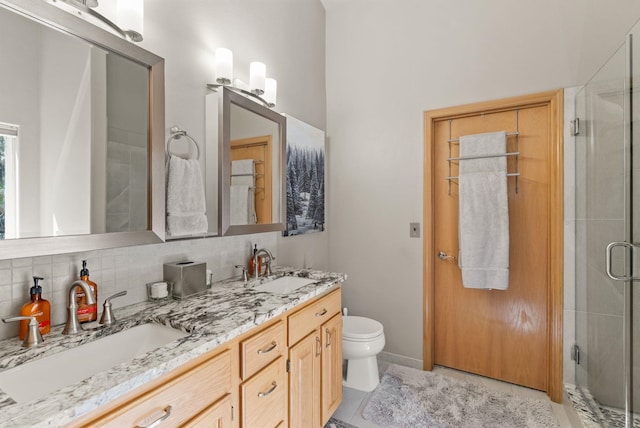 4812 S Wildwood Ln, Spokane, WA 99206 - full bath with double vanity, a stall shower, decorative backsplash, and tile patterned flooring