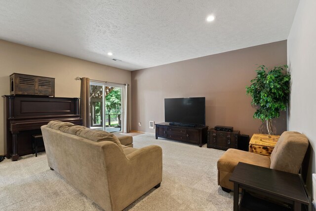 4812 S Wildwood Ln, Spokane, WA 99206 - living area featuring light carpet, recessed lighting, and a textured ceiling