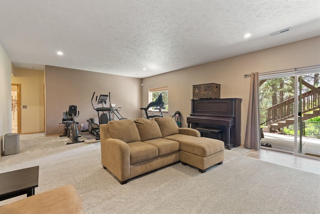 4812 S Wildwood Ln, Spokane, WA 99206 - living room featuring light carpet, recessed lighting, and a textured ceiling