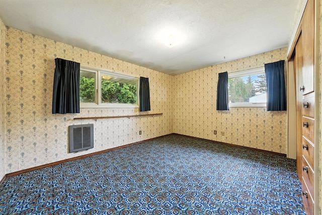 14807 E Broadway Ave, Spokane Valley, WA 99216 - unfurnished room featuring baseboards and wallpapered walls