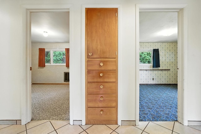 14807 E Broadway Ave, Spokane Valley, WA 99216 - corridor featuring wallpapered walls, carpet, and tile patterned flooring