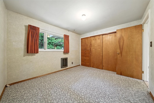 14807 E Broadway Ave, Spokane Valley, WA 99216 - unfurnished bedroom with carpet flooring, a closet, and heating unit