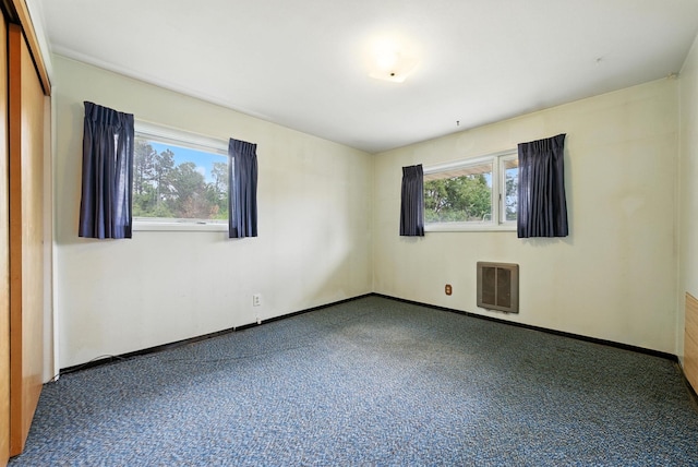 14807 E Broadway Ave, Spokane Valley, WA 99216 - carpeted spare room featuring heating unit and baseboards