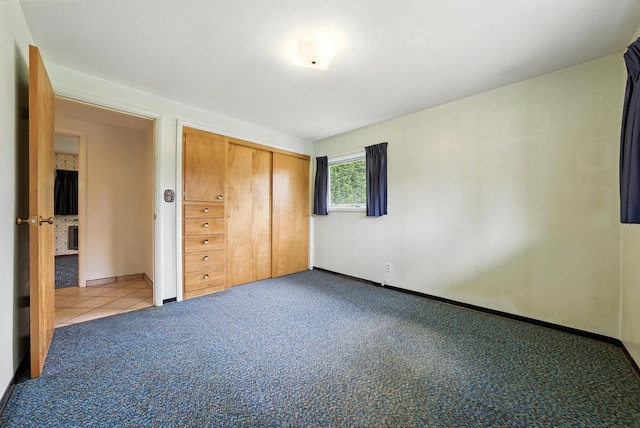 14807 E Broadway Ave, Spokane Valley, WA 99216 - unfurnished bedroom with a closet and carpet floors