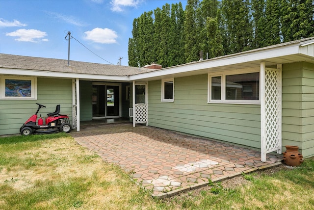 14807 E Broadway Ave, Spokane Valley, WA 99216 - back of house featuring a patio area and a lawn