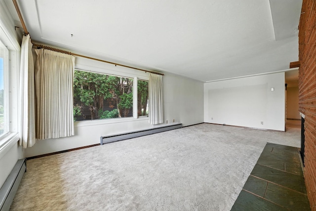 14807 E Broadway Ave, Spokane Valley, WA 99216 - unfurnished living room featuring a baseboard radiator, plenty of natural light, and carpet floors