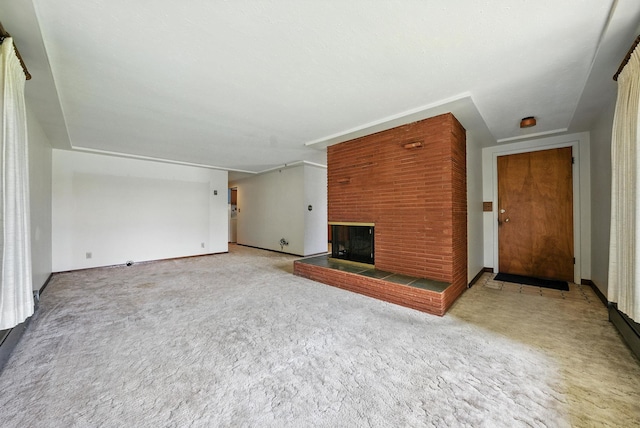 14807 E Broadway Ave, Spokane Valley, WA 99216 - unfurnished living room featuring a fireplace and carpet flooring