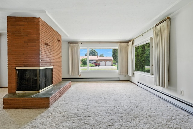 14807 E Broadway Ave, Spokane Valley, WA 99216 - unfurnished living room featuring a baseboard radiator, a brick fireplace, and carpet