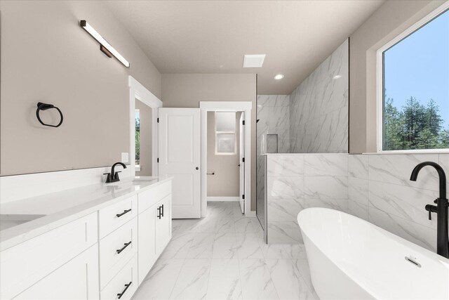 6571 Kate Dr, Nine Mile Falls, WA 99206 - full bath featuring marble finish floors, a soaking tub, double vanity, a marble finish shower, and recessed lighting