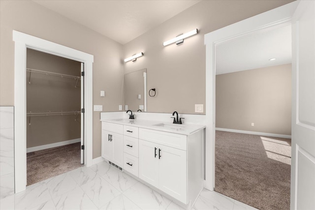 6571 Kate Dr, Nine Mile Falls, WA 99206 - full bath with double vanity, marble finish flooring, and a walk in closet