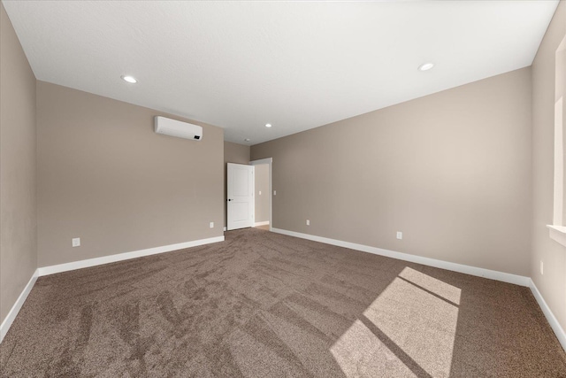 6571 Kate Dr, Nine Mile Falls, WA 99206 - spare room with carpet, a wall unit AC, and recessed lighting