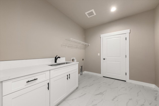 6571 Kate Dr, Nine Mile Falls, WA 99206 - washroom featuring hookup for an electric dryer, washer hookup, cabinet space, light marble finish flooring, and recessed lighting