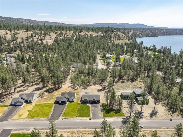 6571 Kate Dr, Nine Mile Falls, WA 99206 - bird's eye view of a heavily wooded area and a water and mountain view