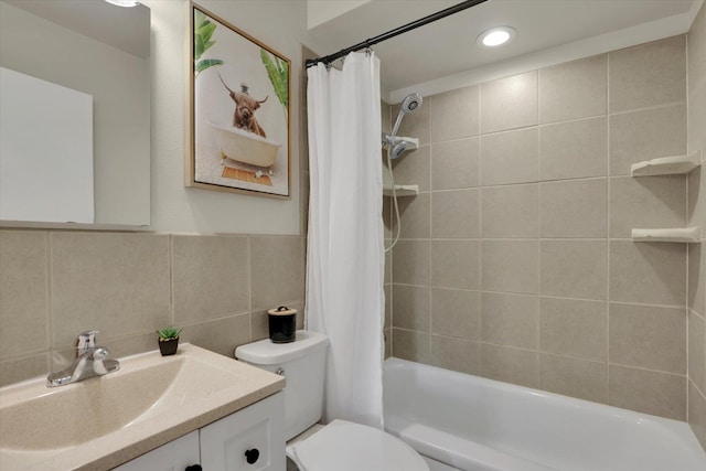 1406 S Cedar St Unit 1408, Spokane, WA 99203 - full bath featuring vanity, shower / bath combo, tile walls, and recessed lighting