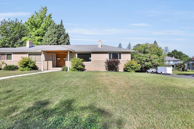 1406 S Cedar St Unit 1408, Spokane, WA 99203 - single story home with a chimney and a front lawn