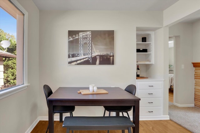 1406 S Cedar St Unit 1408, Spokane, WA 99203 - dining space featuring plenty of natural light and wood finished floors