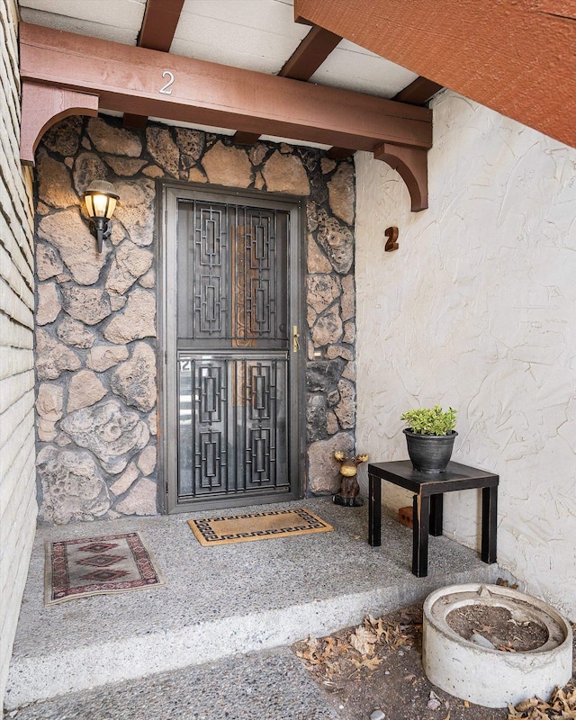 1716 N Pettet Dr Apt 2, Spokane, WA 99205 - entrance to property with stone siding