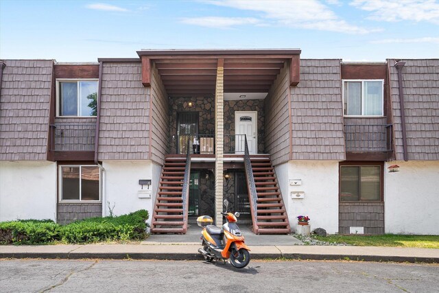 1716 N Pettet Dr Apt 2, Spokane, WA 99205 - view of building exterior with stairway