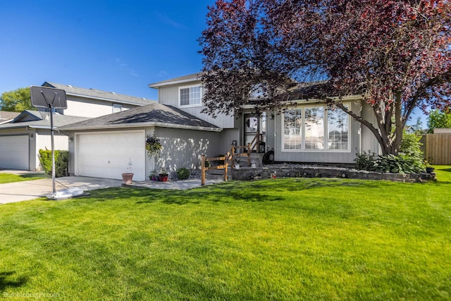 1612 E Sharpsburg Ave, Spokane, WA 99217 - split level home featuring a garage and concrete driveway