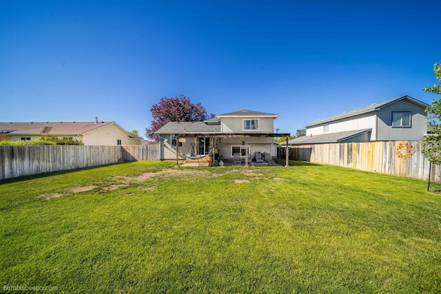 1612 E Sharpsburg Ave, Spokane, WA 99217 - back of house with a fenced backyard and a patio area