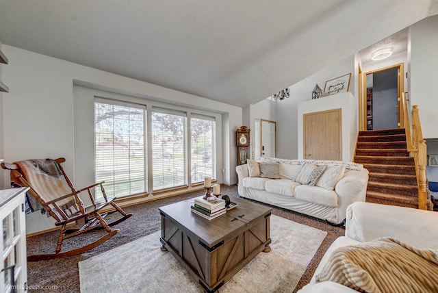 1612 E Sharpsburg Ave, Spokane, WA 99217 - living area featuring light carpet, lofted ceiling, and stairs