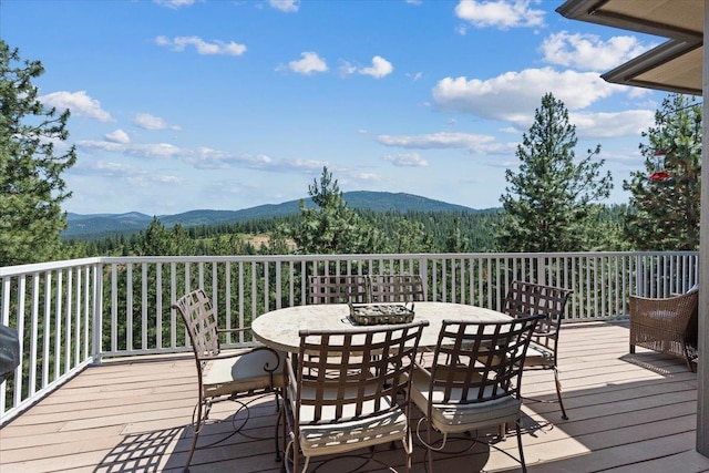7105 S Saddle Ridge Ln, Spokane Valley, WA 99016 - deck with a mountain view and outdoor dining area
