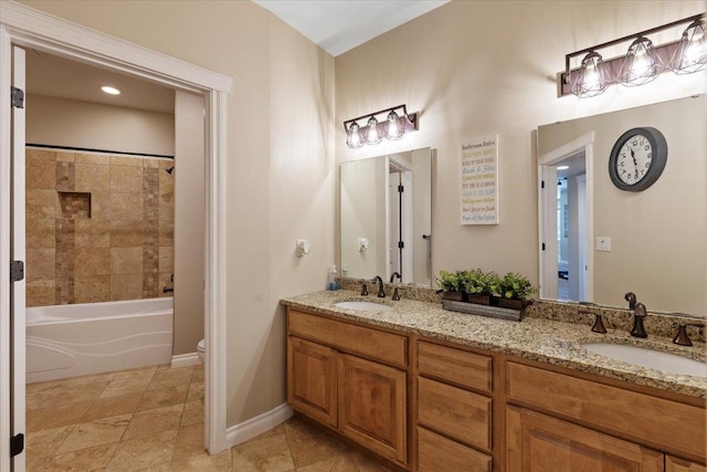 7105 S Saddle Ridge Ln, Spokane Valley, WA 99016 - full bathroom with double vanity and bathtub / shower combination