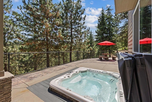 7105 S Saddle Ridge Ln, Spokane Valley, WA 99016 - view of swimming pool with an outdoor hot tub