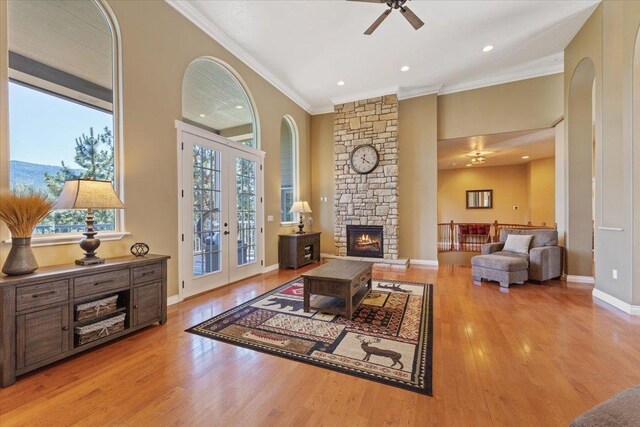 7105 S Saddle Ridge Ln, Spokane Valley, WA 99016 - living area with ornamental molding, ceiling fan, wood finished floors, french doors, and recessed lighting