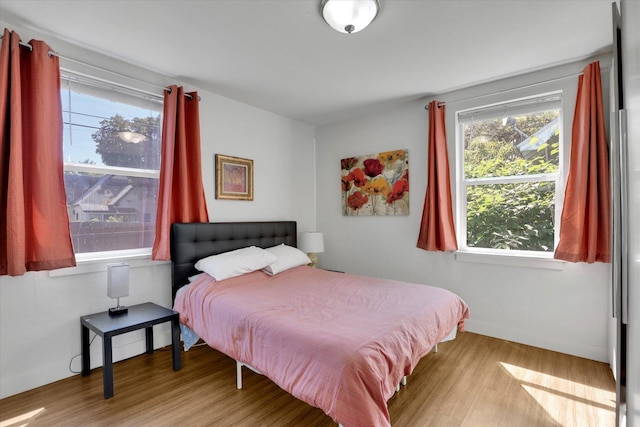 2505 W Mallon Ave, Spokane, WA 99201 - bedroom with multiple windows and wood finished floors