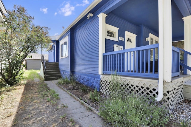 2505 W Mallon Ave, Spokane, WA 99201 - view of property exterior featuring covered porch and stairs