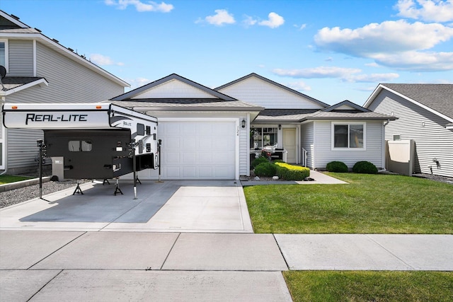 124 S Lone Tree Ave, Spokane Valley, WA 99016 - ranch-style house featuring a garage, driveway, a front yard, and roof with shingles