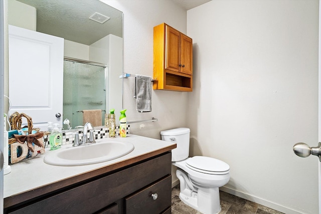 124 S Lone Tree Ave, Spokane Valley, WA 99016 - bathroom with a shower stall, vanity, and stone finish floors