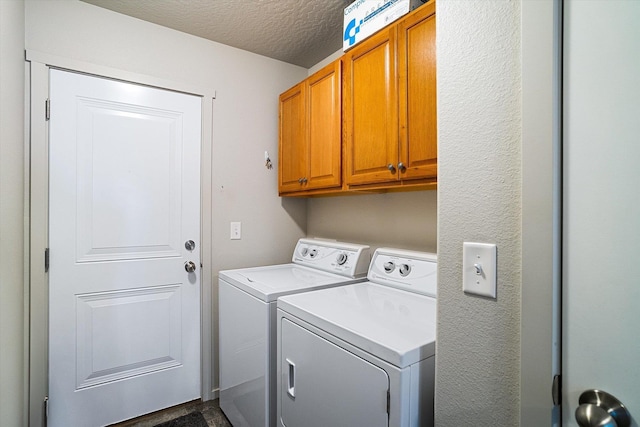 124 S Lone Tree Ave, Spokane Valley, WA 99016 - laundry room with cabinet space, washer and dryer, and a textured ceiling