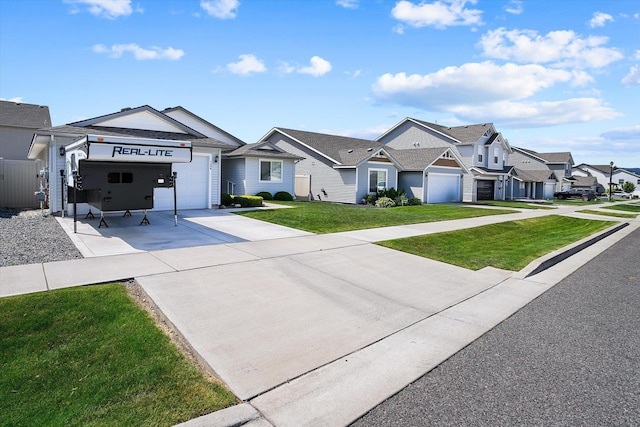 124 S Lone Tree Ave, Spokane Valley, WA 99016 - view of front of home with concrete driveway, a residential view, a garage, and a front yard