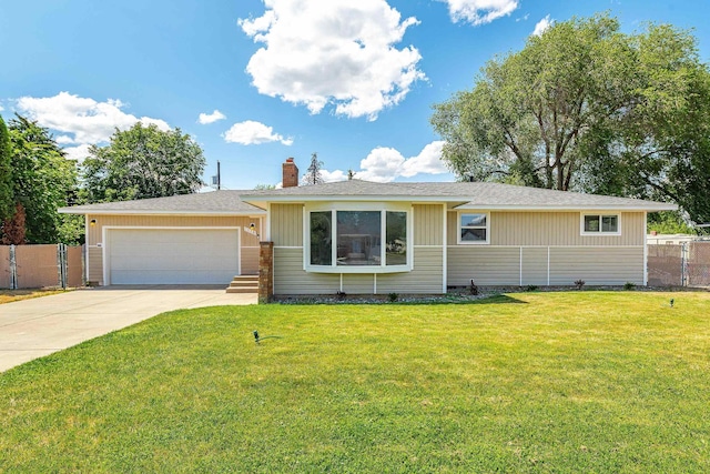 1718 S Bolivar Rd, Spokane Valley, WA 99037 - single story home with a garage, concrete driveway, a chimney, and a shingled roof