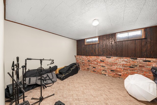 1718 S Bolivar Rd, Spokane Valley, WA 99037 - playroom featuring brick wall, carpet, and plenty of natural light